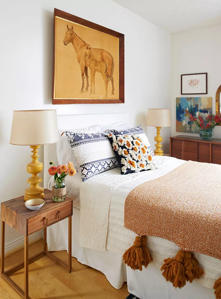 boho bedroom horse art yellow lamps warm tones